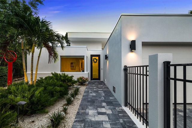 904 Virginia Dr, Sarasota, FL 34234 - entrance to property with stucco siding and a gate
