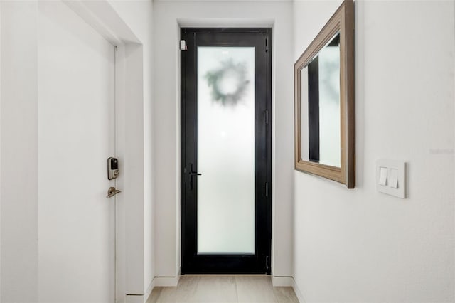 904 Virginia Dr, Sarasota, FL 34234 - doorway to outside with baseboards