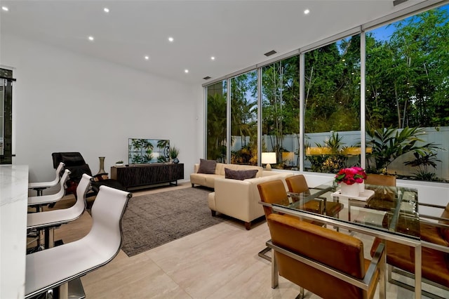 904 Virginia Dr, Sarasota, FL 34234 - living area featuring expansive windows, healthy amount of natural light, and recessed lighting