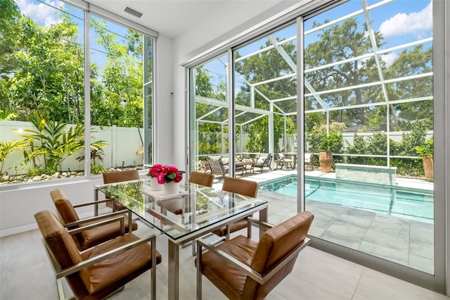 904 Virginia Dr, Sarasota, FL 34234 - sunroom featuring a swimming pool