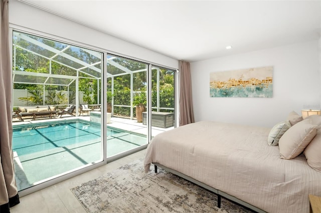 904 Virginia Dr, Sarasota, FL 34234 - bedroom featuring access to outside, a sunroom, and multiple windows