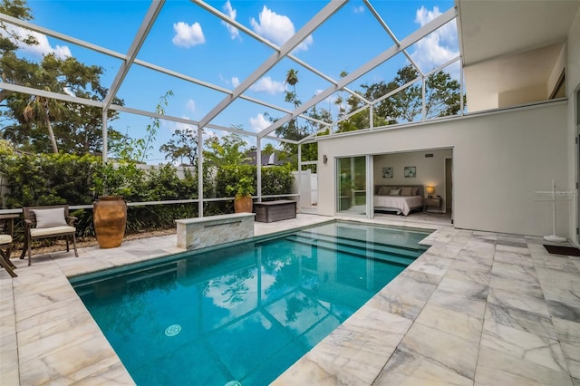 904 Virginia Dr, Sarasota, FL 34234 - outdoor pool with an outdoor hangout area, a patio area, and glass enclosure