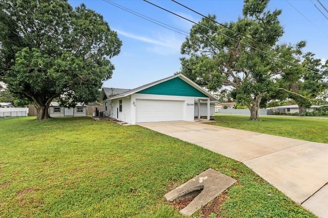 2708 Wilkinson Rd, Sarasota, FL 34231 - single story home with an attached garage, stucco siding, and driveway