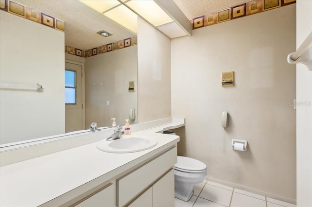 2708 Wilkinson Rd, Sarasota, FL 34231 - bathroom with vanity, tile patterned floors, and a textured ceiling