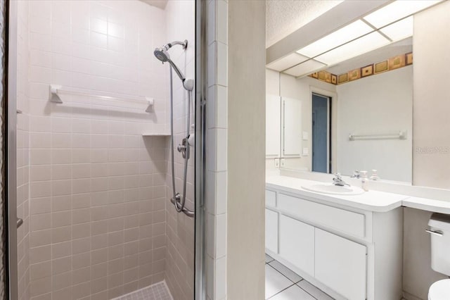 2708 Wilkinson Rd, Sarasota, FL 34231 - full bath featuring a shower stall, vanity, and tile patterned floors