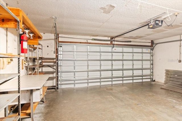 2708 Wilkinson Rd, Sarasota, FL 34231 - garage featuring a garage door opener