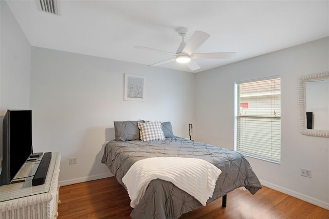 2710 93rd Ct E, Palmetto, FL 34221 - bedroom with wood finished floors and ceiling fan