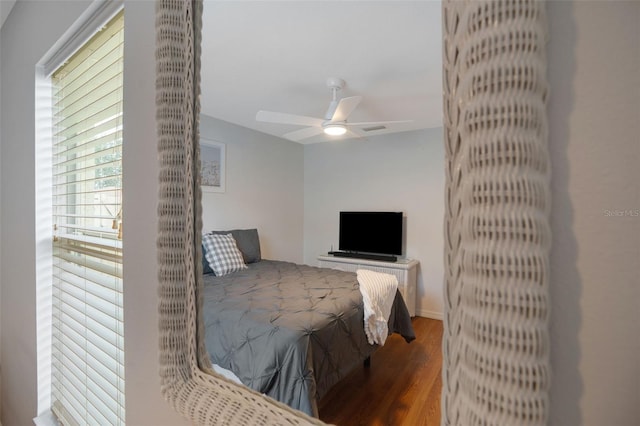 2710 93rd Ct E, Palmetto, FL 34221 - bedroom featuring wood finished floors and ceiling fan