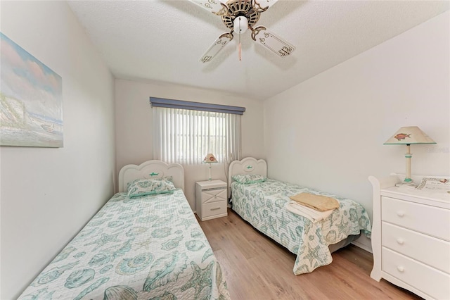 3905 34th Avenue Dr W Unit 36, Bradenton, FL 34205 - bedroom featuring light wood-type flooring and a ceiling fan