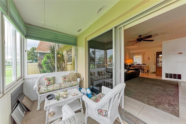 3905 34th Avenue Dr W Unit 36, Bradenton, FL 34205 - sunroom featuring a ceiling fan and an outdoor hangout area
