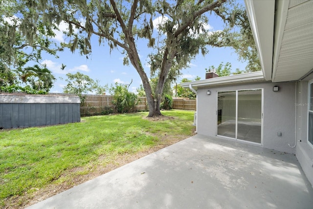 3959 Coleridge Pl, Sarasota, FL 34241 - fenced backyard with a patio area and a storage shed