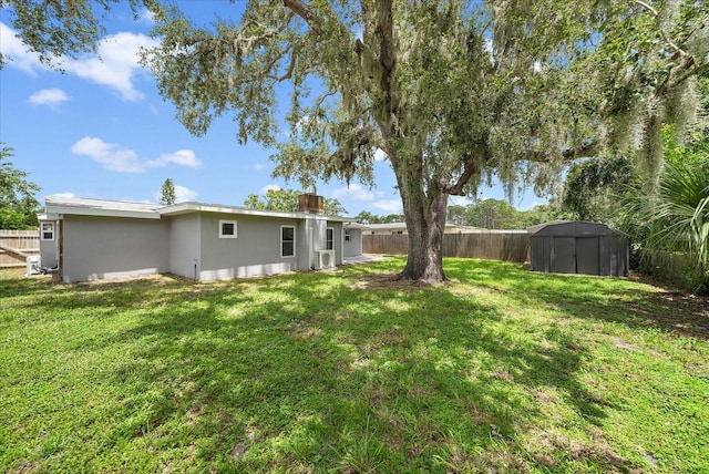3959 Coleridge Pl, Sarasota, FL 34241 - fenced backyard featuring a storage shed and cooling unit