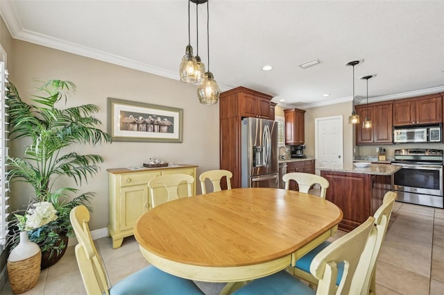202 75th St, Holmes Beach, FL 34217 - dining room featuring ornamental molding, light tile patterned floors, and recessed lighting