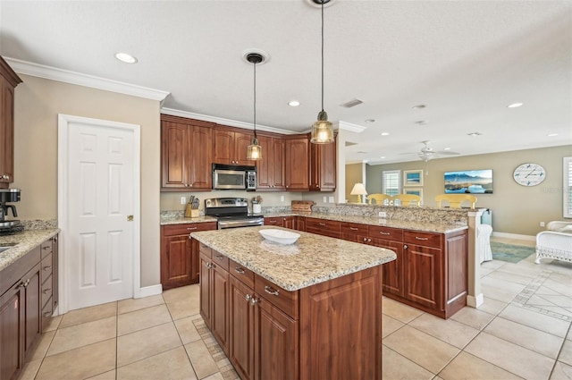 202 75th St, Holmes Beach, FL 34217 - kitchen featuring appliances with stainless steel finishes, a peninsula, light tile patterned flooring, a kitchen island, and a ceiling fan