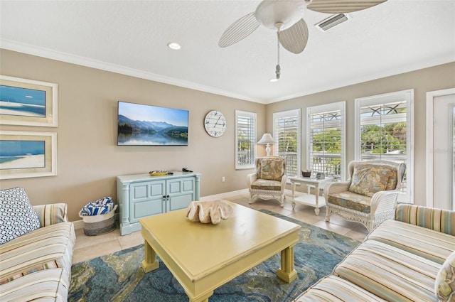 202 75th St, Holmes Beach, FL 34217 - living area with tile patterned floors, a ceiling fan, ornamental molding, and recessed lighting