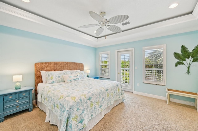 202 75th St, Holmes Beach, FL 34217 - bedroom featuring a raised ceiling, access to exterior, light colored carpet, recessed lighting, and ceiling fan