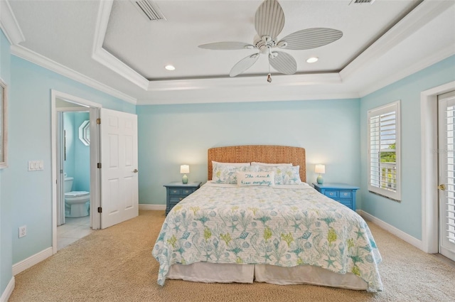 202 75th St, Holmes Beach, FL 34217 - carpeted bedroom with crown molding, a raised ceiling, ensuite bathroom, recessed lighting, and ceiling fan