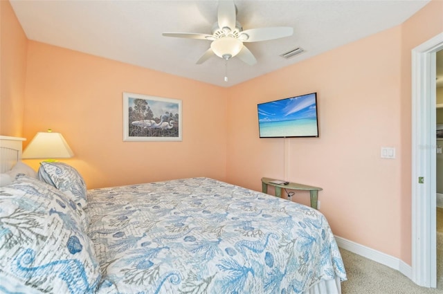 202 75th St, Holmes Beach, FL 34217 - bedroom with carpet and ceiling fan