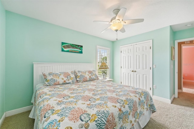 202 75th St, Holmes Beach, FL 34217 - carpeted bedroom with a closet and ceiling fan