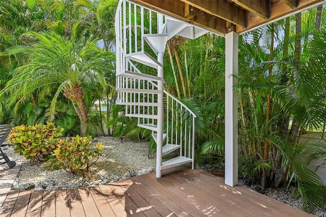 202 75th St, Holmes Beach, FL 34217 - wooden deck featuring stairs