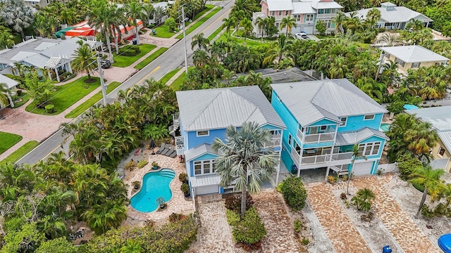 202 75th St, Holmes Beach, FL 34217 - aerial perspective of suburban area featuring a pool
