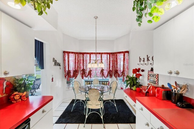 5766 Beaurivage Ave, Sarasota, FL 34243 - view of tiled dining space