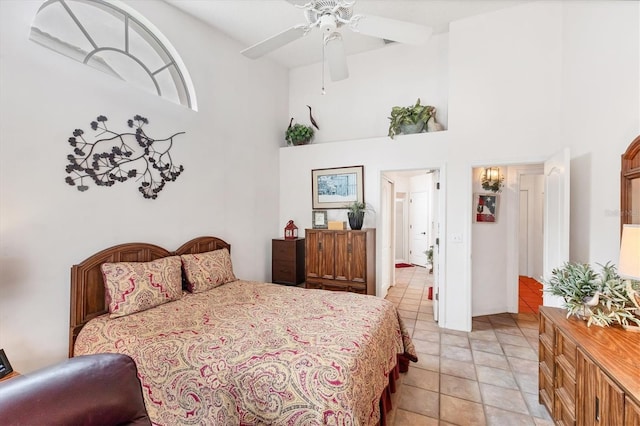 5766 Beaurivage Ave, Sarasota, FL 34243 - bedroom featuring a towering ceiling, a ceiling fan, and ensuite bath