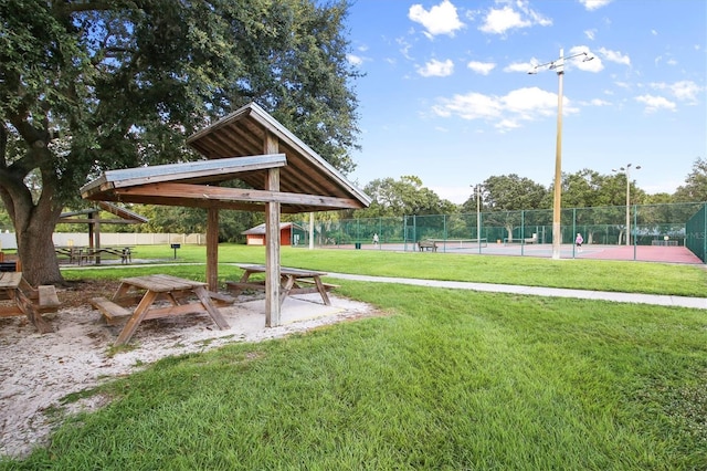 5766 Beaurivage Ave, Sarasota, FL 34243 - view of community featuring a tennis court
