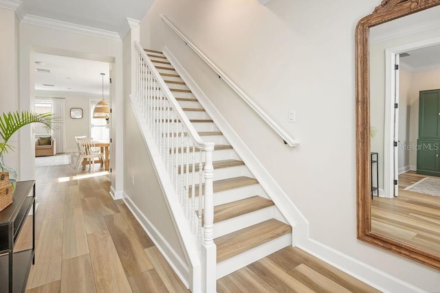12017 Cranston Way, Bradenton, FL 34211 - staircase featuring ornamental molding and wood finished floors