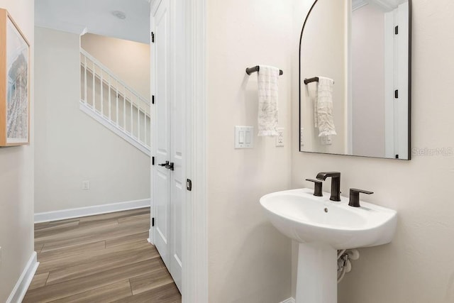 12017 Cranston Way, Bradenton, FL 34211 - bathroom featuring wood finished floors and baseboards