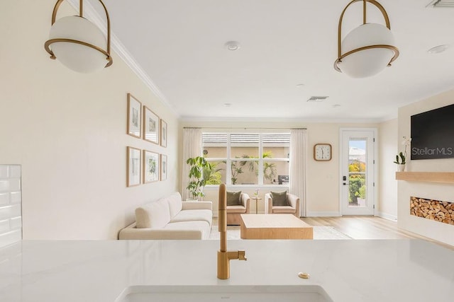 12017 Cranston Way, Bradenton, FL 34211 - living room featuring crown molding and wood finished floors