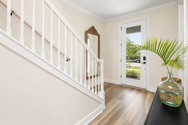 12017 Cranston Way, Bradenton, FL 34211 - foyer entrance featuring wood finished floors, ornamental molding, and stairs