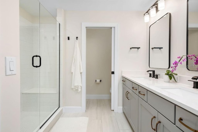 12017 Cranston Way, Bradenton, FL 34211 - bathroom with a shower stall and double vanity