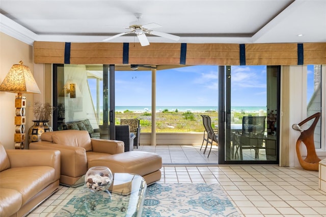 546A Beach Rd Unit A544, Sarasota, FL 34242 - living area featuring a ceiling fan, tile patterned flooring, and a water view