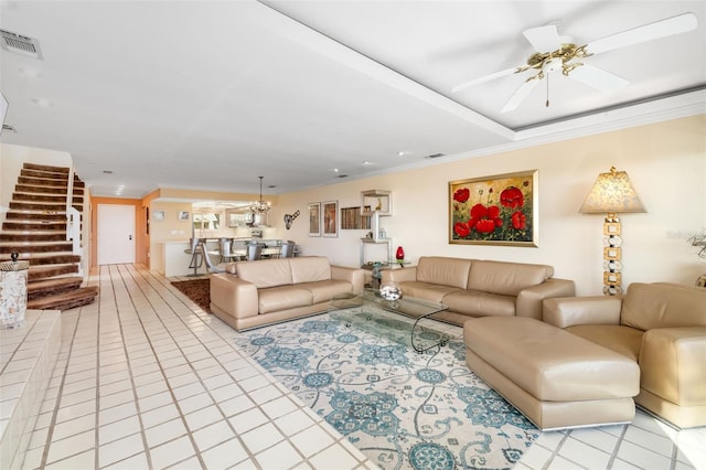 546A Beach Rd Unit A544, Sarasota, FL 34242 - living area with stairs, light tile patterned floors, crown molding, a ceiling fan, and a chandelier