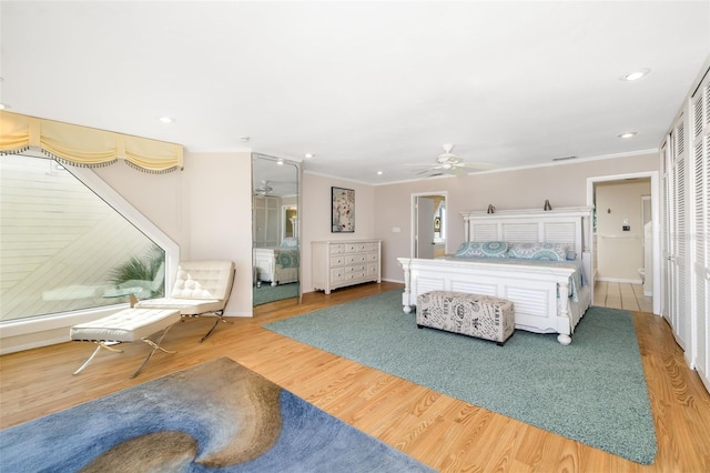 546A Beach Rd Unit A544, Sarasota, FL 34242 - bedroom with crown molding, wood finished floors, recessed lighting, and ceiling fan