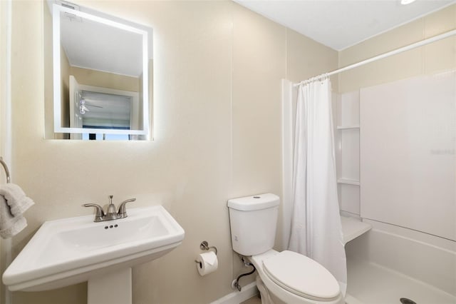 546A Beach Rd Unit A544, Sarasota, FL 34242 - bathroom featuring toilet and a shower with curtain