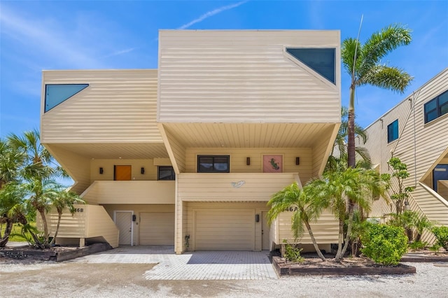 546A Beach Rd Unit A544, Sarasota, FL 34242 - view of front of house with a garage and driveway