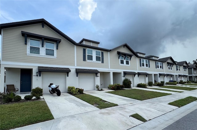 5812 Ocean Isle Dr, Nokomis, FL 34275 - view of property with an attached garage, driveway, and a front lawn