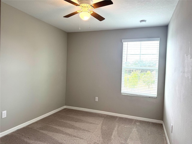 5812 Ocean Isle Dr, Nokomis, FL 34275 - unfurnished room featuring carpet floors, a ceiling fan, a smoke detector, and a textured ceiling