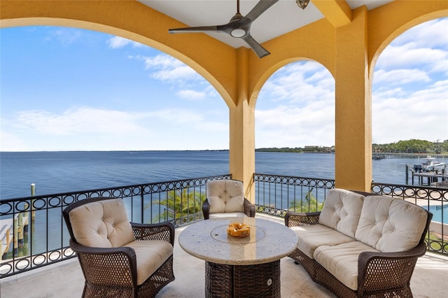 309 Ringling Point Dr, Sarasota, FL 34234 - balcony featuring an outdoor living space, a water view, and ceiling fan