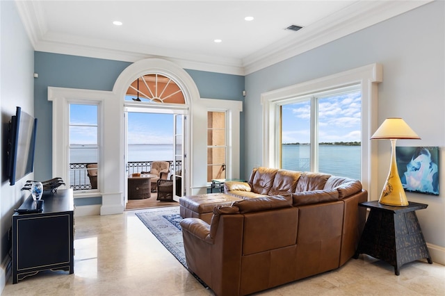 309 Ringling Point Dr, Sarasota, FL 34234 - living room with crown molding, healthy amount of natural light, a water view, and recessed lighting