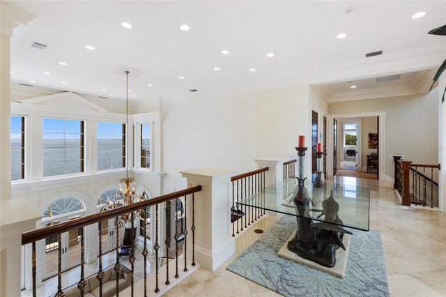 309 Ringling Point Dr, Sarasota, FL 34234 - hallway featuring an upstairs landing, crown molding, recessed lighting, and a chandelier