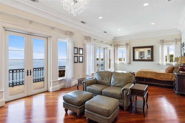309 Ringling Point Dr, Sarasota, FL 34234 - bedroom featuring french doors, access to outside, wood finished floors, ornamental molding, and recessed lighting