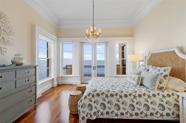 309 Ringling Point Dr, Sarasota, FL 34234 - bedroom featuring a chandelier, dark wood-style flooring, access to exterior, and ornamental molding