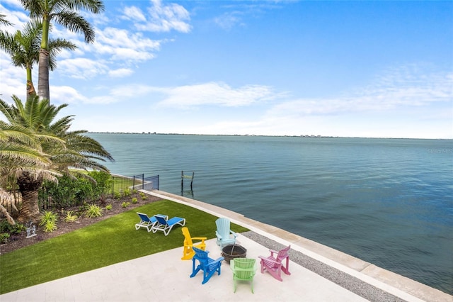 309 Ringling Point Dr, Sarasota, FL 34234 - water view with a fire pit and a boat dock