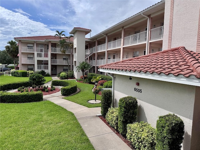 6505 Stone River Rd Unit 309, Bradenton, FL 34203 - view of property's community featuring a yard