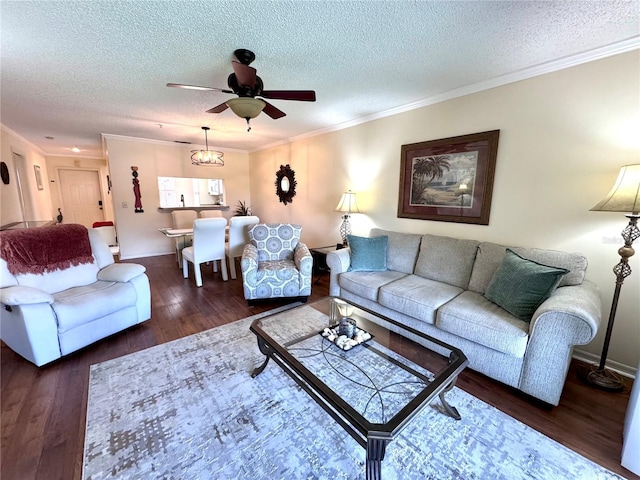 6505 Stone River Rd Unit 309, Bradenton, FL 34203 - living area with wood finished floors, ceiling fan, a textured ceiling, and ornamental molding