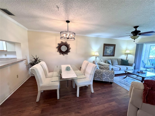 6505 Stone River Rd Unit 309, Bradenton, FL 34203 - living area with a textured ceiling, dark wood-style floors, ornamental molding, and a ceiling fan