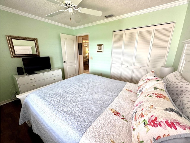 6505 Stone River Rd Unit 309, Bradenton, FL 34203 - bedroom featuring ornamental molding, a closet, wood finished floors, a textured ceiling, and a ceiling fan